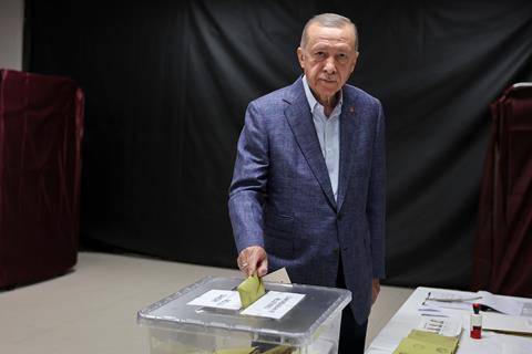 President Erdogan of Turkey placing his vote in the ballot box