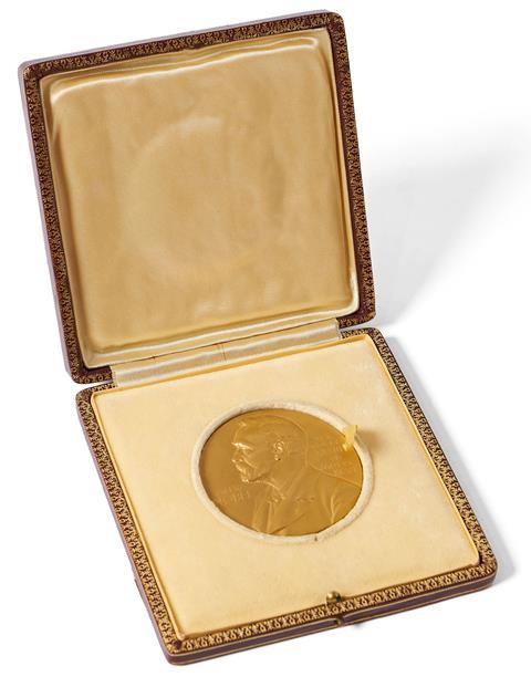 A nobel prize medal in its box