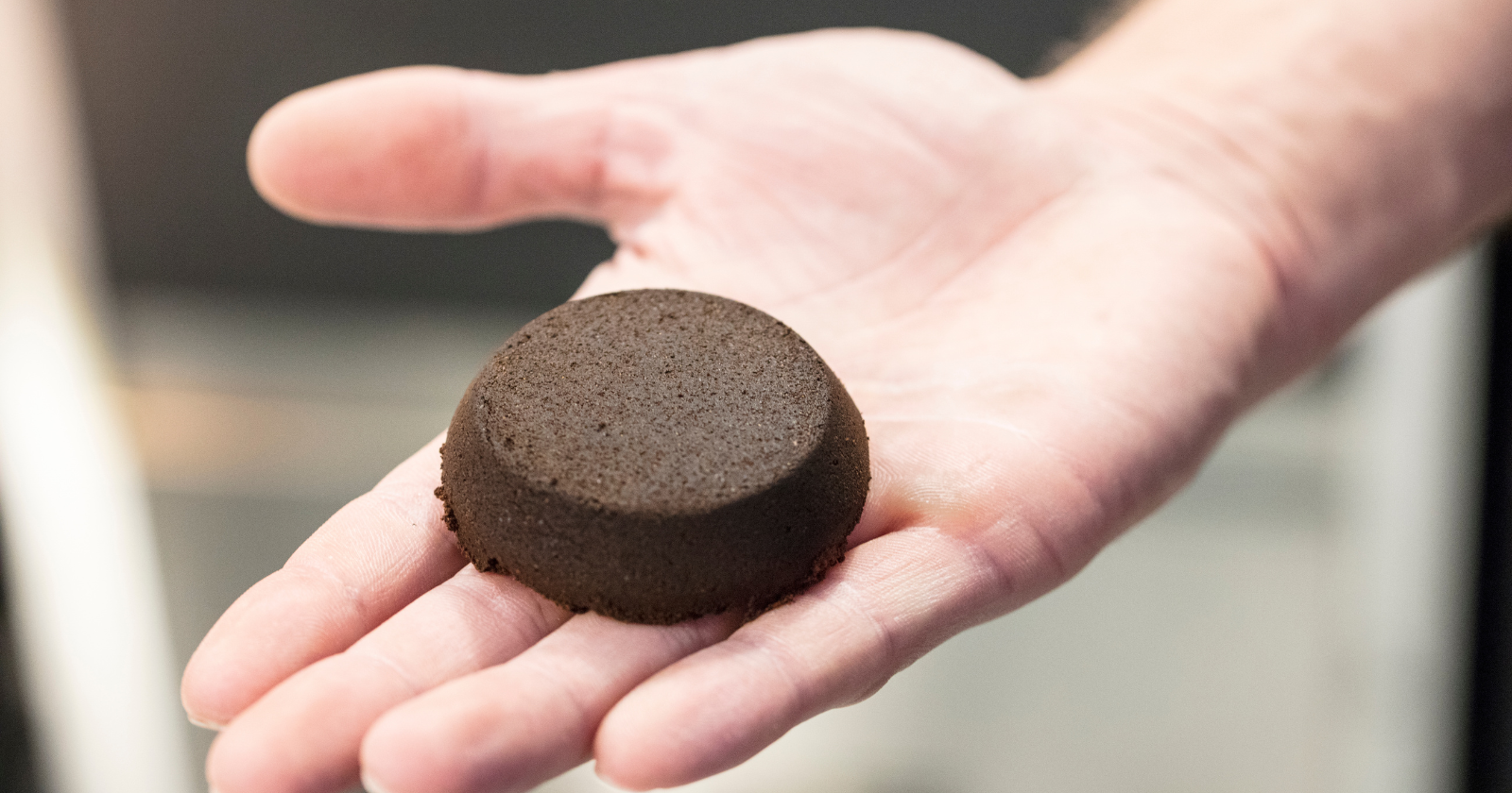 Improved Compressive Strength of Concrete Utilizing Biochar from 350°C Charred Coffee Grounds Substituting 15% Sand