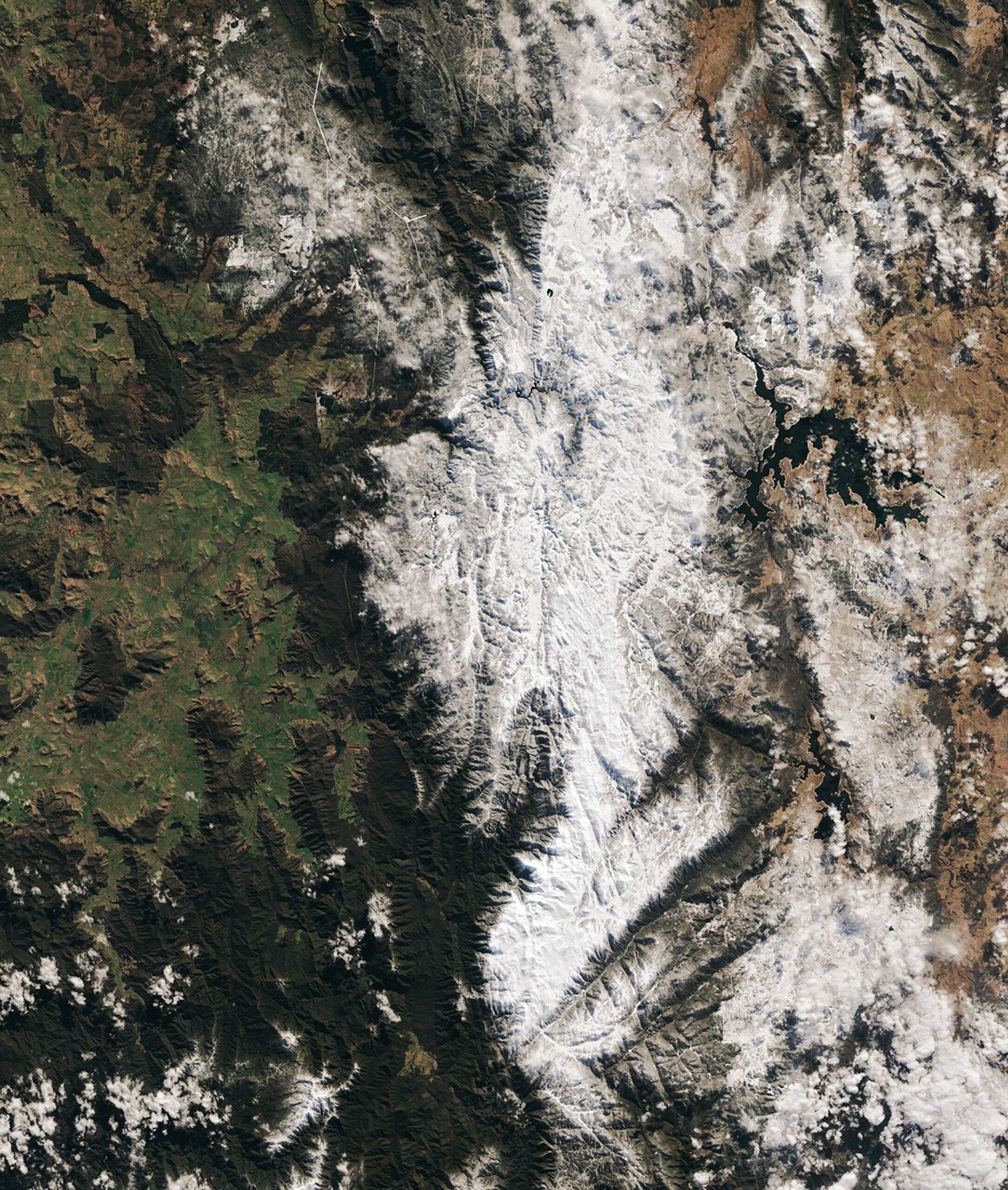 Mount Kosciuszko, Australia's Tallest Summit, Attains 2,228 Metres and Encounters Substantial Snow Accumulations from Cold Fronts of the Southern Ocean